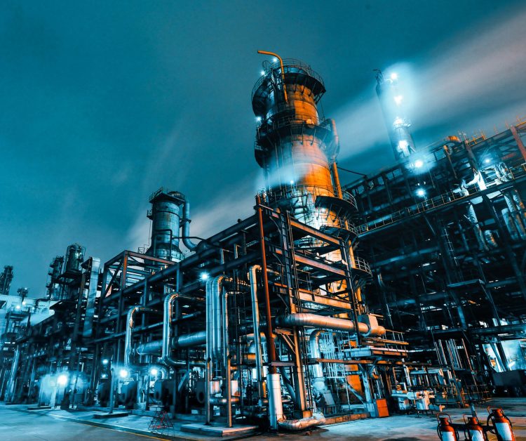 Oil Refinery, Chemical & Petrochemical plant abstract at night.